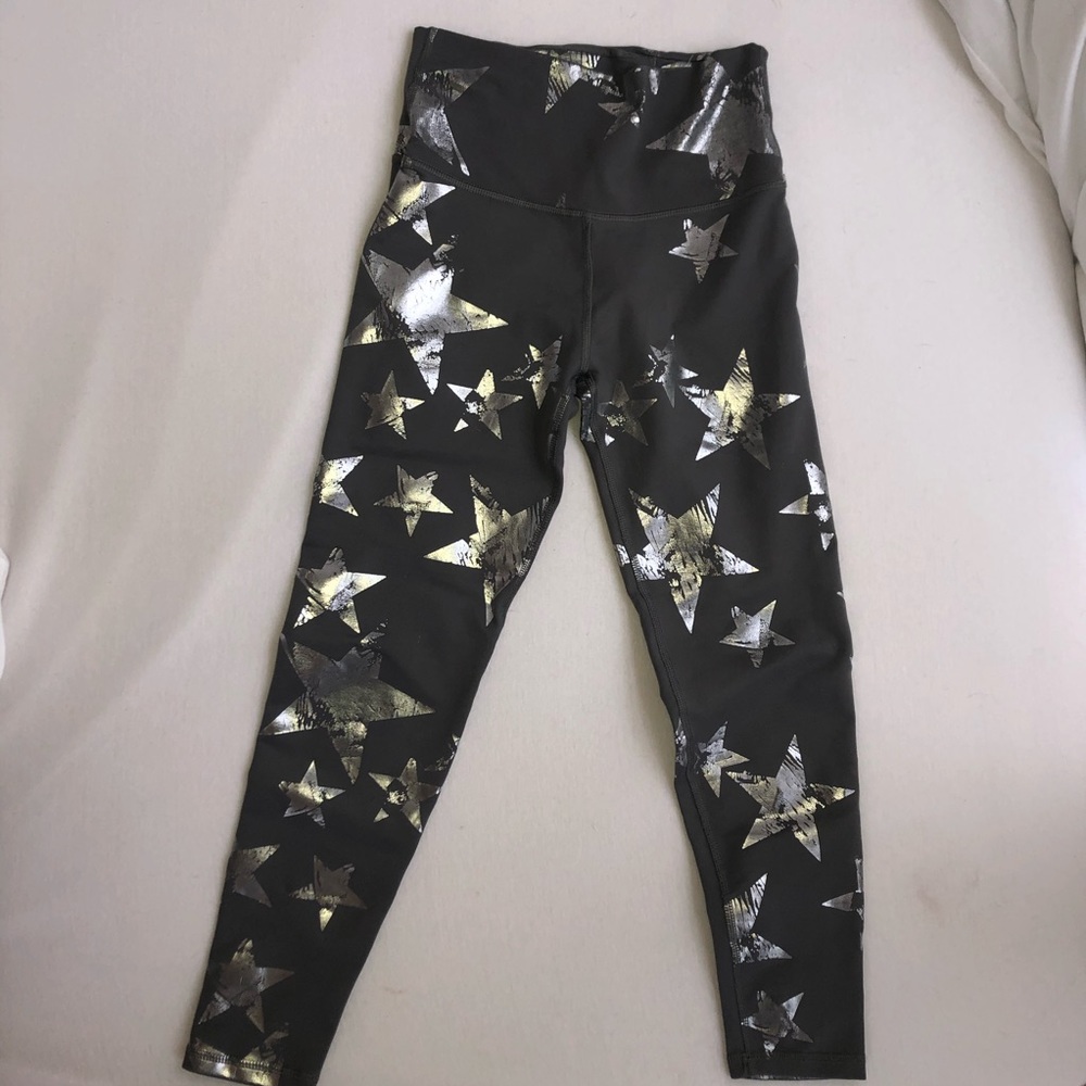 Metallic silver star patterned AERIE leggings